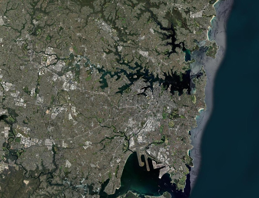 Vue du ciel : Sydney et sa baie dentelée